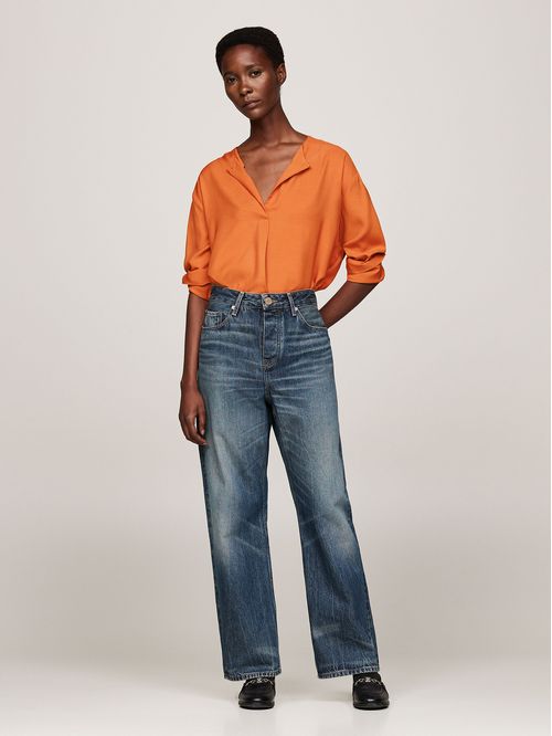 Blusa Amplia Con Botón En Relieve