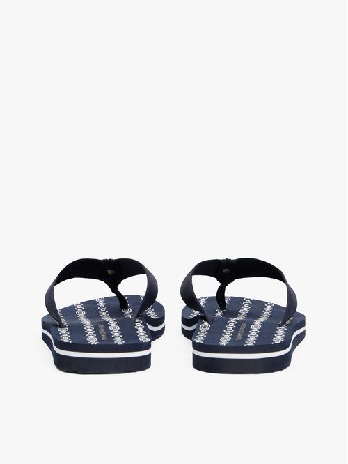 Sandalias de tiras trenzadas con monograma TH