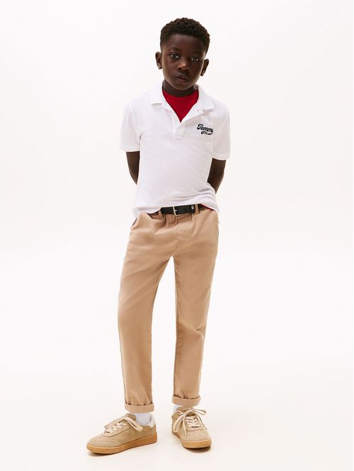 Polo Varsity Con Logo Gráfico De Niño